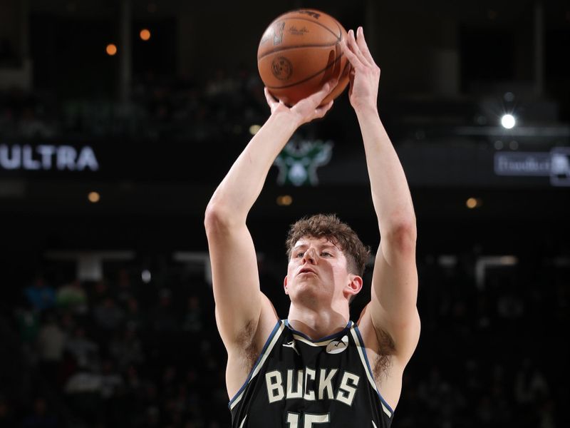 MILWAUKEE, WI - JANUARY 15: Liam Robbins #15 of the Milwaukee Bucks shoots a free throw during the game against the Orlando Magic on January 15, 2025 at Fiserv Forum Center in Milwaukee, Wisconsin. NOTE TO USER: User expressly acknowledges and agrees that, by downloading and or using this Photograph, user is consenting to the terms and conditions of the Getty Images License Agreement. Mandatory Copyright Notice: Copyright 2025 NBAE (Photo by Gary Dineen/NBAE via Getty Images).