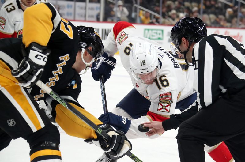 Dec 3, 2024; Pittsburgh, Pennsylvania, USA;  Pittsburgh Penguins center Sidney Crosby (87) and Florida Panthers center Aleksander Barkov (16) take a face-off during the second period at PPG Paints Arena. Mandatory Credit: Charles LeClaire-Imagn Images