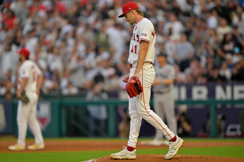 May 26, 2025; Anaheim, California, USA;  Los Angeles Angels starting pitcher Jack Kochanowicz (41) stands on the mound after walking in a run in the fourth inning against the New York Yankees at Angel Stadium. Mandatory Credit: Jayne Kamin-Oncea-Imagn Images
