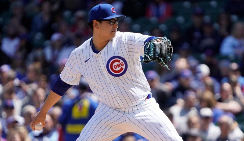 May 5, 2024; Chicago, Illinois, USA; Chicago Cubs pitcher Javier Assad (72) throws the ball against the Milwaukee Brewers during the first inning at Wrigley Field. Mandatory Credit: David Banks-USA TODAY Sports