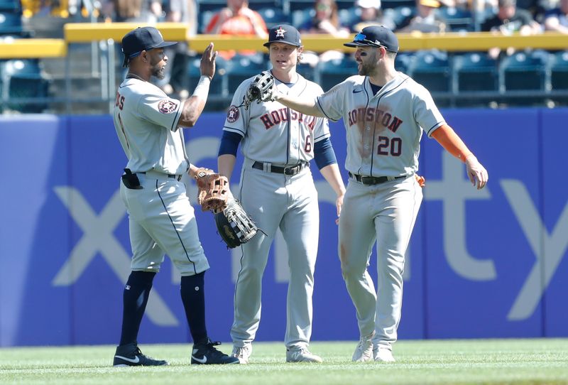 Apr 12, 2023; Pittsburgh, Pennsylvania, USA;  Houston Astros left fielder Corey Julks (9), center fielder Jake Meyers (6) and right fielder Chas McCormick (20) celebrate in the outfield after defeating the Pittsburgh Pirates at PNC Park. The Astros shutout the Pirates 7-0. Mandatory Credit: Charles LeClaire-USA TODAY Sports