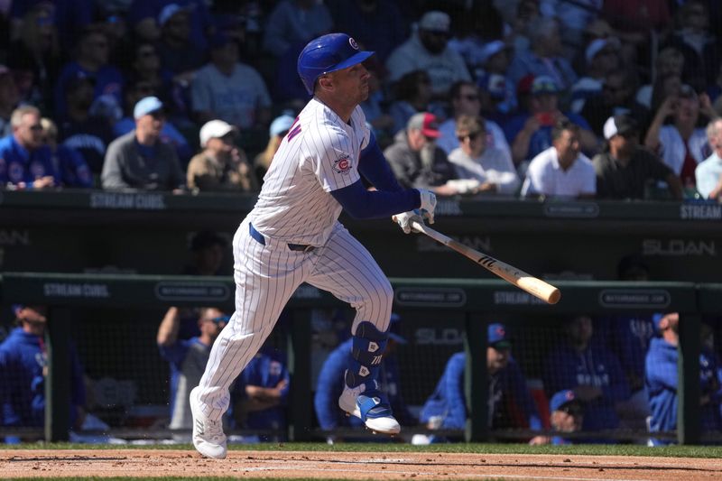 Feb 20, 2026; Mesa, Arizona, USA; Chicago Cubs third baseman Alex Bregman (3) hits against the Chicago White Sox in the first inning at Sloan Park. Mandatory Credit: Rick Scuteri-Imagn Images