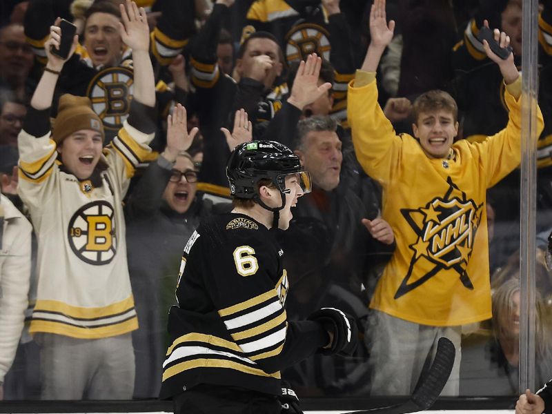 Feb 29, 2024; Boston, Massachusetts, USA; Boston Bruins defenseman Mason Lohrei (6) celebrates his winning goal against the Vegas Golden Knights during the third period of their 5-4 win at TD Garden. Mandatory Credit: Winslow Townson-USA TODAY Sports