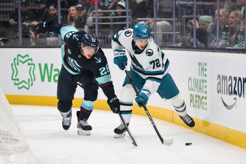 Nov 30, 2024; Seattle, Washington, USA; San Jose Sharks left wing William Eklund (72) plays the puck while defended by Seattle Kraken center Ryan Winterton (26) during the first period at Climate Pledge Arena. Mandatory Credit: Steven Bisig-Imagn Images