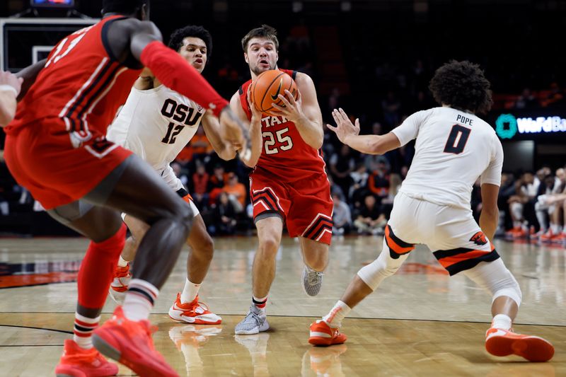 Jan 26, 2023; Corvallis, Oregon, USA; Utah Utes guard Rollie Worster (25) drives for the basket between Oregon State Beavers forward Michael Rataj (12) and guard Jordan Pope (0) during the second half at Gill Coliseum. Mandatory Credit: Soobum Im-USA TODAY Sports