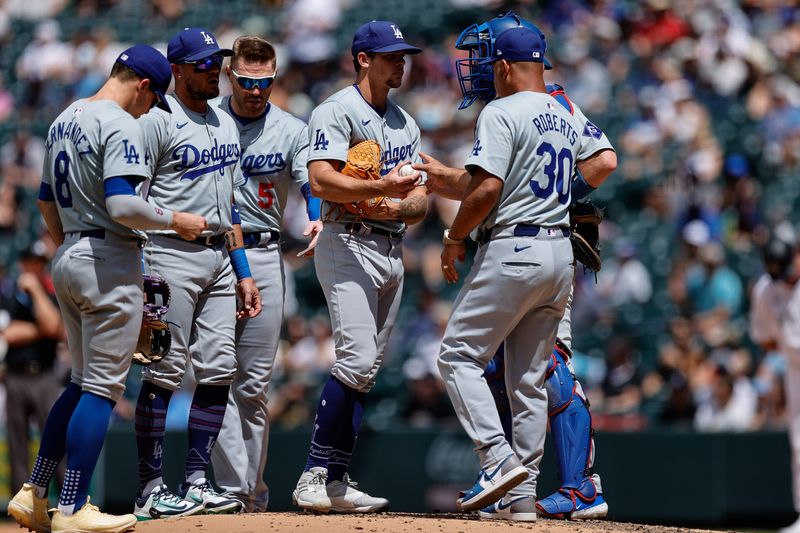 Jun 20, 2024; Denver, Colorado, USA; Los Angeles Dodgers starting pitcher Gavin Stone (35) is pulled by manager Dave Roberts (30) as third baseman Kike Hernandez (8) and shortstop Miguel Rojas (11) and first baseman Freddie Freeman (5) and catcher Will Smith (16) look on in the sixth inning against the Colorado Rockies at Coors Field. Mandatory Credit: Isaiah J. Downing-USA TODAY Sports