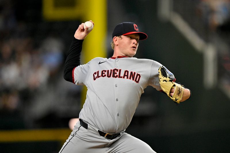 Aug 24, 2025; Arlington, Texas, USA; Cleveland Guardians relief pitcher Nic Enright (59) pitches against the Texas Rangers during the game at Globe Life Field. Mandatory Credit: Jerome Miron-Imagn Images