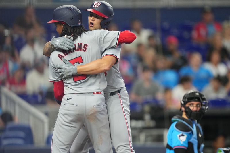 Apr 28, 2024; Miami, Florida, USA;  Miami Marlins center fielder Jazz Chisholm Jr. (2) celebrates a grand slam in the first inning against the Washington Nationals with left fielder Bryan De La Cruz (14) at loanDepot Park. Mandatory Credit: Jim Rassol-USA TODAY Sports