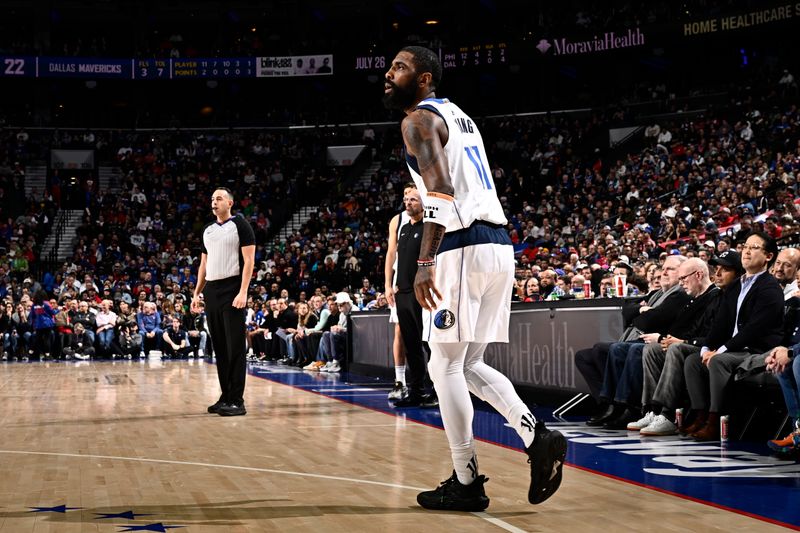 PHILADELPHIA, PA - FEBRUARY 5: Kyrie Irving #11 of the Dallas Mavericks looks on during the game against the Philadelphia 76ers on February 5, 2024 at the Wells Fargo Center in Philadelphia, Pennsylvania NOTE TO USER: User expressly acknowledges and agrees that, by downloading and/or using this Photograph, user is consenting to the terms and conditions of the Getty Images License Agreement. Mandatory Copyright Notice: Copyright 2024 NBAE (Photo by David Dow/NBAE via Getty Images)