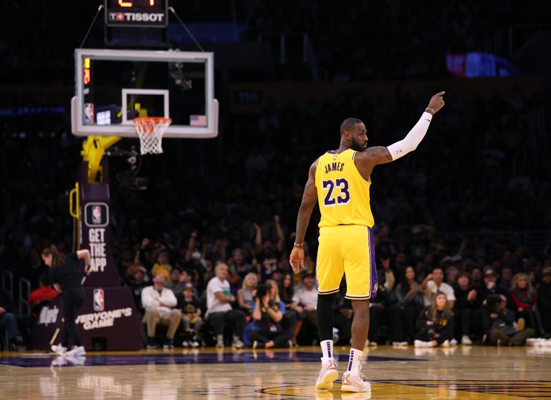 LOS ANGELES, CALIFORNIA - JANUARY 03: LeBron James #23 of the Los Angeles Lakers reacts to a Miami Heat foul during a 110-96 Heat win at Crypto.com Arena on January 03, 2024 in Los Angeles, California. (Photo by Harry How/Getty Images)