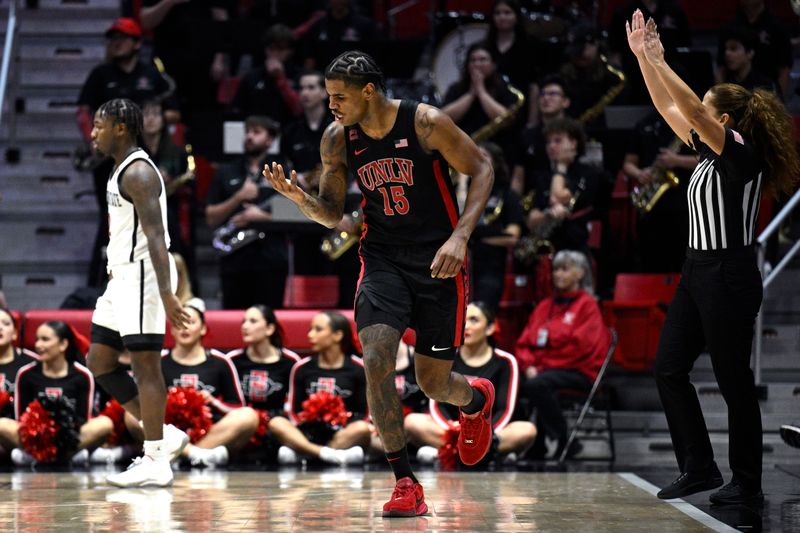 Jan 6, 2024; San Diego, California, USA; UNLV Rebels guard Luis Rodriguez (15) reacts after a three-point basket against the San Diego State Aztecs during the second half at Viejas Arena. Mandatory Credit: Orlando Ramirez-USA TODAY Sports