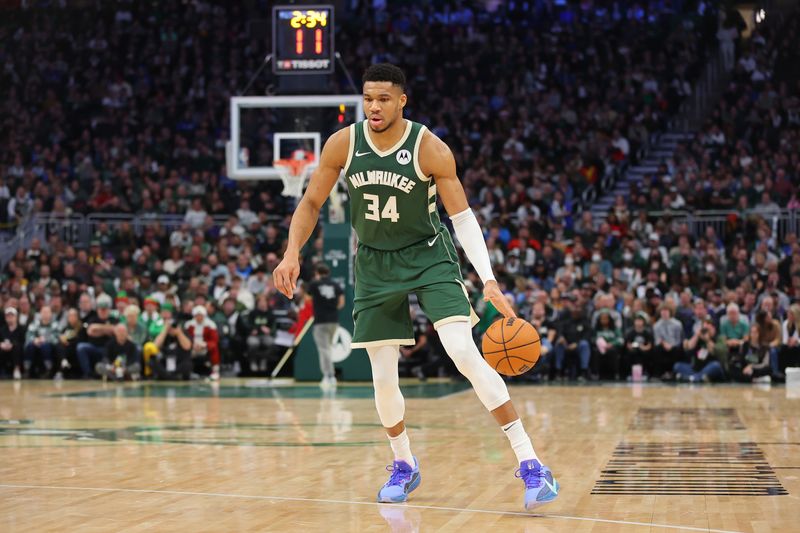 MILWAUKEE, WISCONSIN - DECEMBER 21: Giannis Antetokounmpo #34 of the Milwaukee Bucks handles the ball during a game against the Orlando Magic at Fiserv Forum on December 21, 2023 in Milwaukee, Wisconsin. NOTE TO USER: User expressly acknowledges and agrees that, by downloading and or using this photograph, User is consenting to the terms and conditions of the Getty Images License Agreement. (Photo by Stacy Revere/Getty Images)