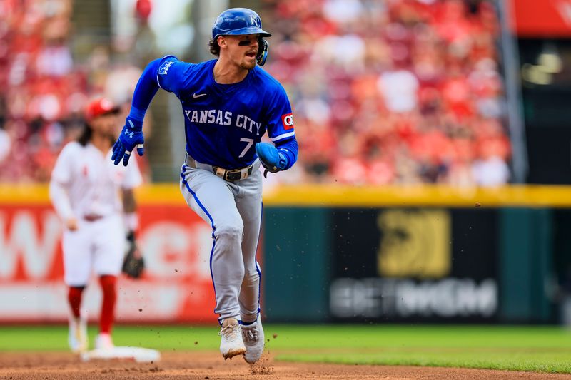 Aug 18, 2024; Cincinnati, Ohio, USA; Kansas City Royals shortstop Bobby Witt Jr. (7) scores on a sacrifice fly hit by first baseman Salvador Perez (not pictured) in the third inning against the Cincinnati Reds at Great American Ball Park. Mandatory Credit: Katie Stratman-USA TODAY Sports