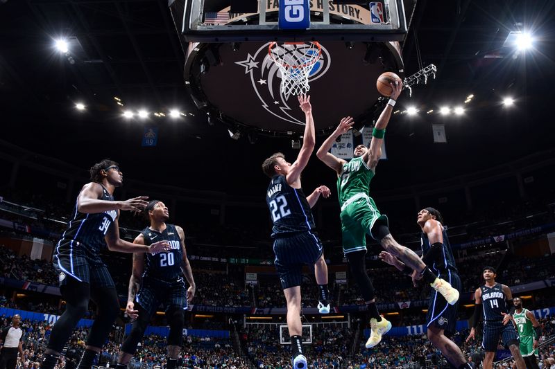 ORLANDO, FL - JANUARY 23: Jayson Tatum #0 of the Boston Celtics drives to the basket during the game against the Orlando Magic on January 23, 2023 at Amway Center in Orlando, Florida. NOTE TO USER: User expressly acknowledges and agrees that, by downloading and or using this photograph, User is consenting to the terms and conditions of the Getty Images License Agreement. Mandatory Copyright Notice: Copyright 2023 NBAE (Photo by Fernando Medina/NBAE via Getty Images)