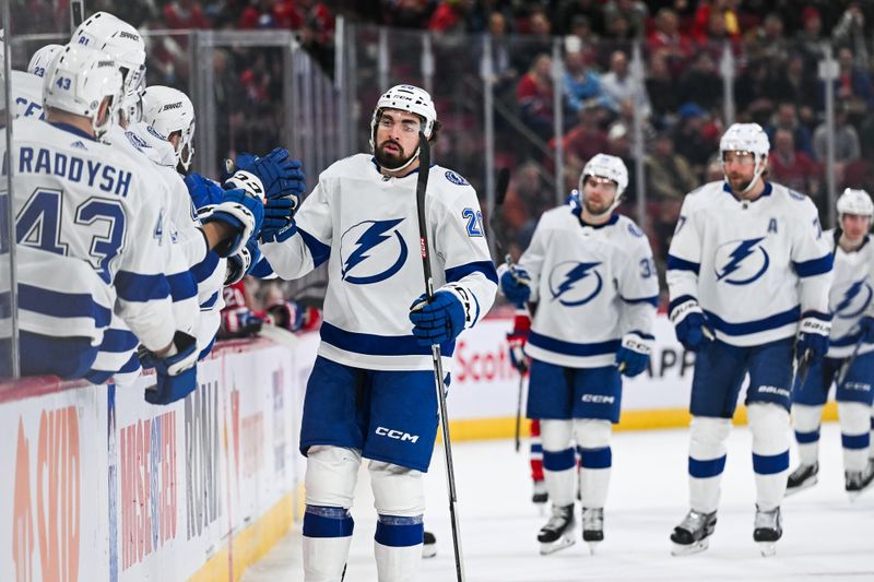 Apr 4, 2024; Montreal, Quebec, CAN; Tampa Bay Lightning left wing Nicholas Paul (20) celebrates his goal against the Montreal Canadiens with his teammates at the bench during the first period at Bell Centre. Mandatory Credit: David Kirouac-USA TODAY Sports