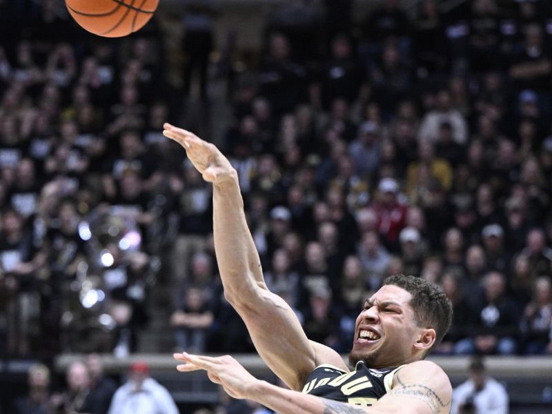 Feb 25, 2023; West Lafayette, Indiana, USA; Purdue Boilermakers forward Mason Gillis (0) passes the ball away agains the Indiana Hoosiers while falling during the second half at Mackey Arena. Indiana won 79-71. Mandatory Credit: Marc Lebryk-USA TODAY Sports