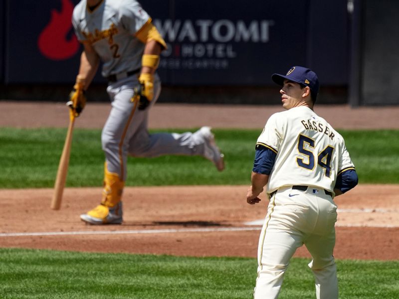 May 15, 2024; Milwaukee, Wisconsin, USA; Milwaukee Brewers pitcher Robert Gasser (54) gives up a sacrifice fly to Pittsburgh Pirates outfielder Connor Joe (2) during the third inning of their game at American Family Field  Mandatory Credit: Mark Hoffman-USA TODAY Sports