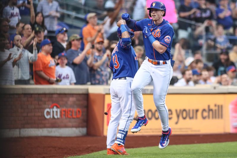 Jul 19, 2023; New York City, New York, USA;  New York Mets third baseman Brett Baty (22) celebrates with New York Mets second baseman Luis Guillorme (13) after hitting a solo home run in the third inning against the Chicago White Sox at Citi Field. Mandatory Credit: Wendell Cruz-USA TODAY Sports