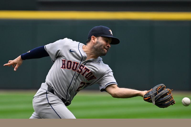 Jun 20, 2024; Chicago, Illinois, USA;  Houston Astros second base Jose Altuve (27) canít make the play on the ball hit by Chicago White Sox catcher Martin Maldonado (15) during the fifth inning at Guaranteed Rate Field. Mandatory Credit: Matt Marton-USA TODAY Sports