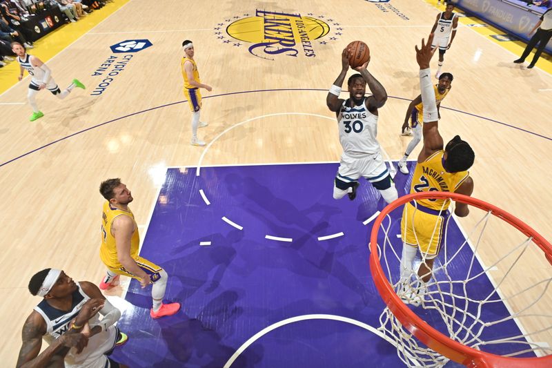 LOS ANGELES, CA - APRIL 22:  Julius Randle #30 of the Minnesota Timberwolves shoots the ball during the game against the Los Angeles Lakers during Round 1 Game 2 of the 2025 NBA Playoffs on April 22, 2025 at Crypto.Com Arena in Los Angeles, California. NOTE TO USER: User expressly acknowledges and agrees that, by downloading and/or using this Photograph, user is consenting to the terms and conditions of the Getty Images License Agreement. Mandatory Copyright Notice: Copyright 2025 NBAE (Photo by Adam Pantozzi/NBAE via Getty Images)