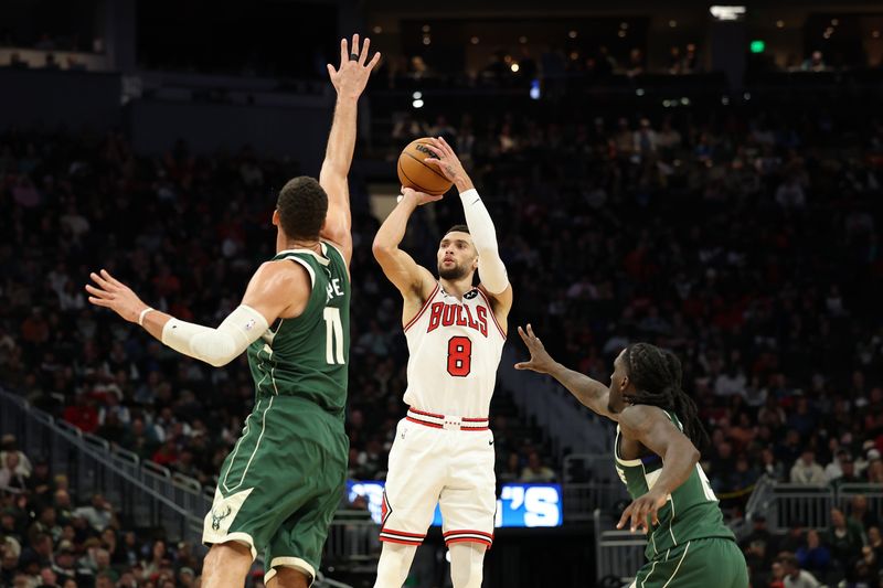 MILWAUKEE, WISCONSIN - NOVEMBER 20: Zach LaVine #8 of the Chicago Bulls shoots over Brook Lopez #11 of the Milwaukee Bucks during the first half of a game at Fiserv Forum on November 20, 2024 in Milwaukee, Wisconsin. NOTE TO USER: User expressly acknowledges and agrees that, by downloading and or using this photograph, User is consenting to the terms and conditions of the Getty Images License Agreement. (Photo by Stacy Revere/Getty Images)