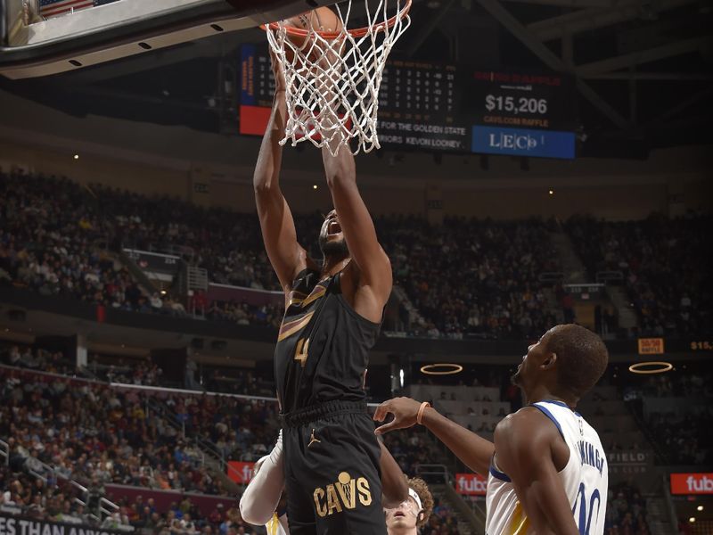 CLEVELAND, OH - NOVEMBER 8: Evan Mobley #4 of the Cleveland Cavaliers shoots the ball during the game against the Golden State Warriors during a regular season game on November 8, 2024 at Rocket Mortgage FieldHouse in Cleveland, Ohio. NOTE TO USER: User expressly acknowledges and agrees that, by downloading and/or using this Photograph, user is consenting to the terms and conditions of the Getty Images License Agreement. Mandatory Copyright Notice: Copyright 2024 NBAE (Photo by David Liam Kyle/NBAE via Getty Images)