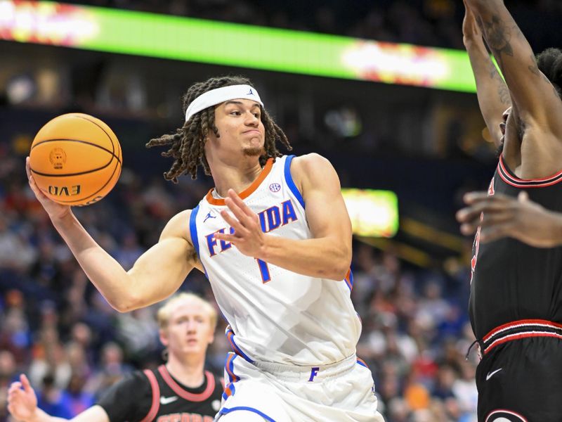 Mar 14, 2024; Nashville, TN, USA;  Florida Gators guard Walter Clayton Jr. (1) passes the ball against the Georgia Bulldogs during the second half at Bridgestone Arena. Mandatory Credit: Steve Roberts-USA TODAY Sports