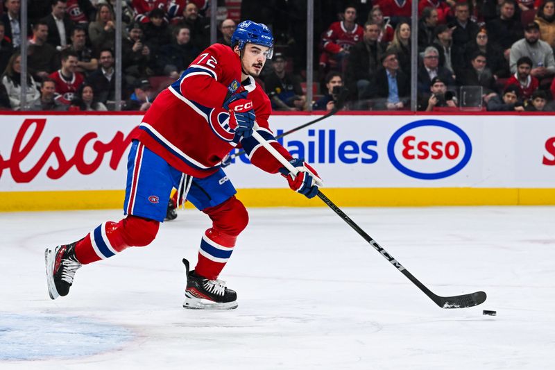 Jan 28, 2025; Montreal, Quebec, CAN; Montreal Canadiens defenseman Arber Xhekaj (72) passes the puck against the Winnipeg Jets during the first period at Bell Centre. Mandatory Credit: David Kirouac-Imagn Images
