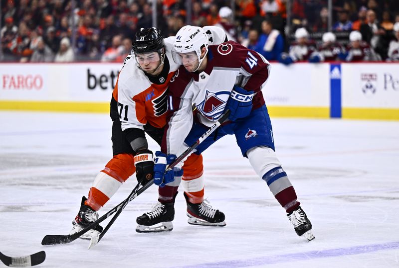 Jan 20, 2024; Philadelphia, Pennsylvania, USA; Philadelphia Flyers right wing Tyson Foerster (71) and Colorado Avalanche right wing Jason Polin (41) battle for position in the second period at Wells Fargo Center. Mandatory Credit: Kyle Ross-USA TODAY Sports