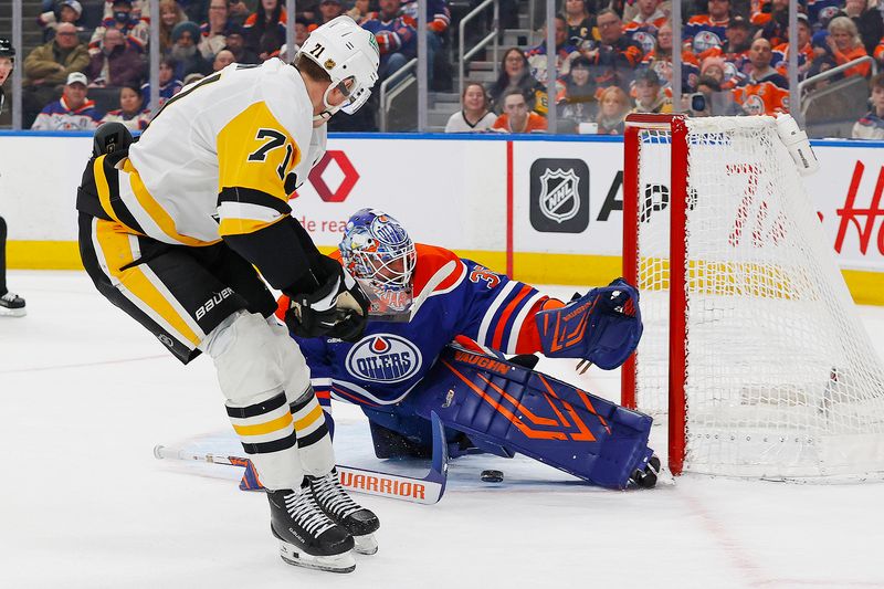 Jan 22, 2026; Edmonton, Alberta, CAN; Pittsburgh Penguins forward Evgeni Malkin (71) scores a goal on Edmonton Oilers goaltender Tristan Jarry (35) during the second period at Rogers Place. Mandatory Credit: Perry Nelson-Imagn Images