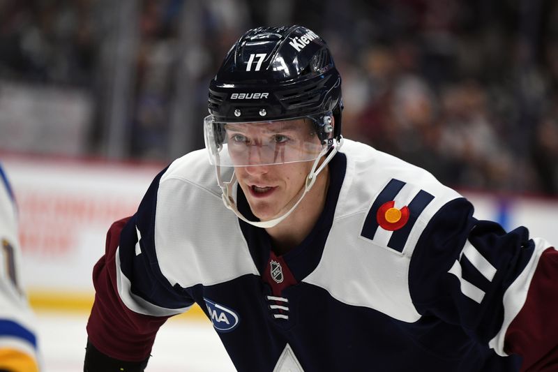 Jan 31, 2025; Denver, Colorado, USA; Colorado Avalanche center Parker Kelly (17) skates in for a face off during the second period against the St. Louis Blues at Ball Arena. Mandatory Credit: Christopher Hanewinckel-Imagn Images