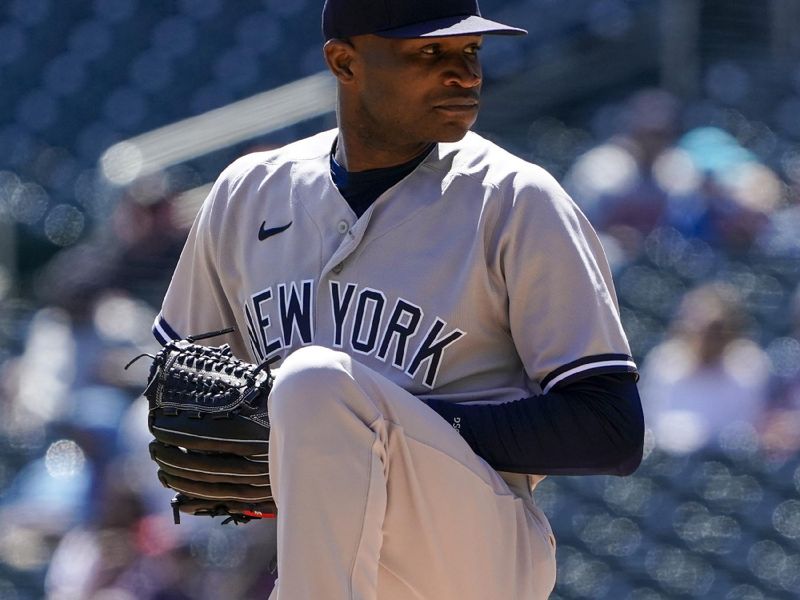 Apr 26, 2023; Minneapolis, Minnesota, USA; New York Yankees pitcher Domingo German (0) delivers a pitch against the Minnesota Twins during the first inning at Target Field. Mandatory Credit: Nick Wosika-USA TODAY Sports

