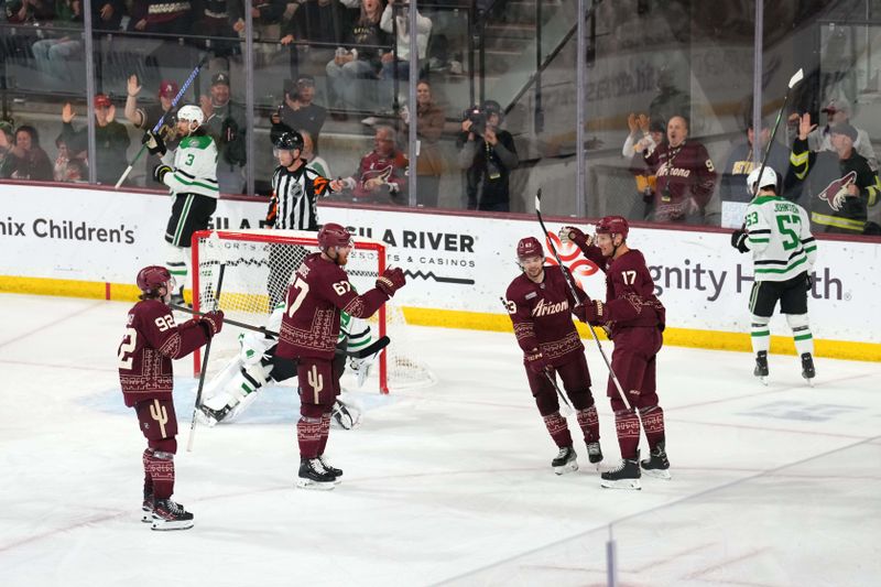 Mar 24, 2024; Tempe, Arizona, USA; Arizona Coyotes center Nick Bjugstad (17) celebrates a goal against the Dallas Stars during the third period at Mullett Arena. Mandatory Credit: Joe Camporeale-USA TODAY Sports