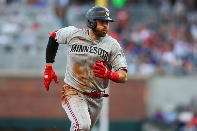 Jun 27, 2023; Atlanta, Georgia, USA; Minnesota Twins left fielder Joey Gallo (13) runs to third against the Atlanta Hawks in the second inning at Truist Park. Mandatory Credit: Brett Davis-USA TODAY Sports