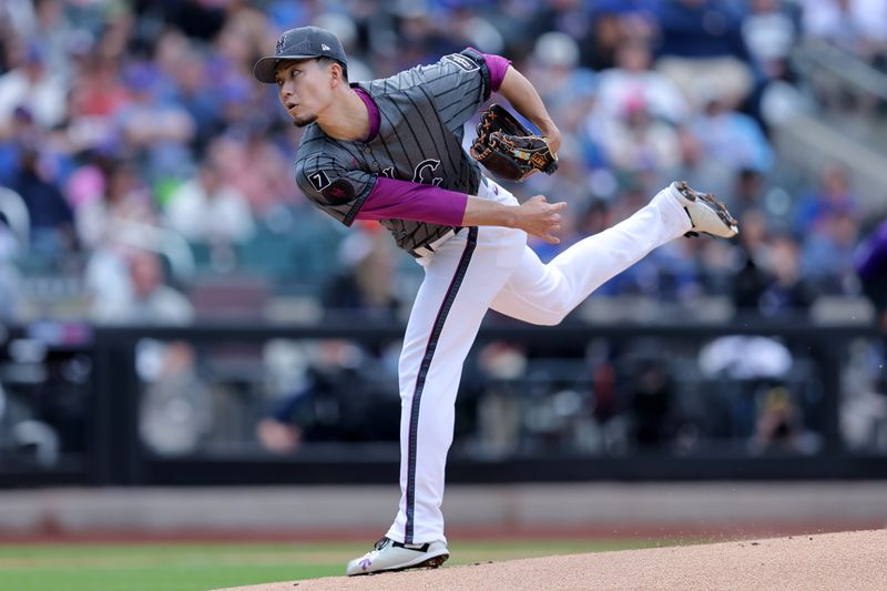 May 31, 2025; New York City, New York, USA; New York Mets starting pitcher Kodai Senga (34) follows through on a pitch against the Colorado Rockies during the first inning at Citi Field. Mandatory Credit: Brad Penner-Imagn Images