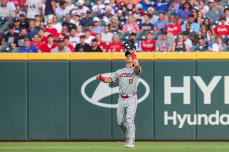 Jul 22, 2024; Atlanta, Georgia, USA; Cincinnati Reds center fielder Stuart Fairchild (17) catches a fly ball against the Atlanta Braves in the first inning at Truist Park. Mandatory Credit: Brett Davis-USA TODAY Sports