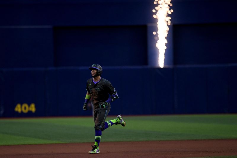 Aug 10, 2024; St. Petersburg, Florida, USA; Tampa Bay Rays short stop Jose Caballero (7) rounds the bases after hitting a solo home run in the seventh inning against the Baltimore Orioles at Tropicana Field. Mandatory Credit: Jonathan Dyer-USA TODAY Sports