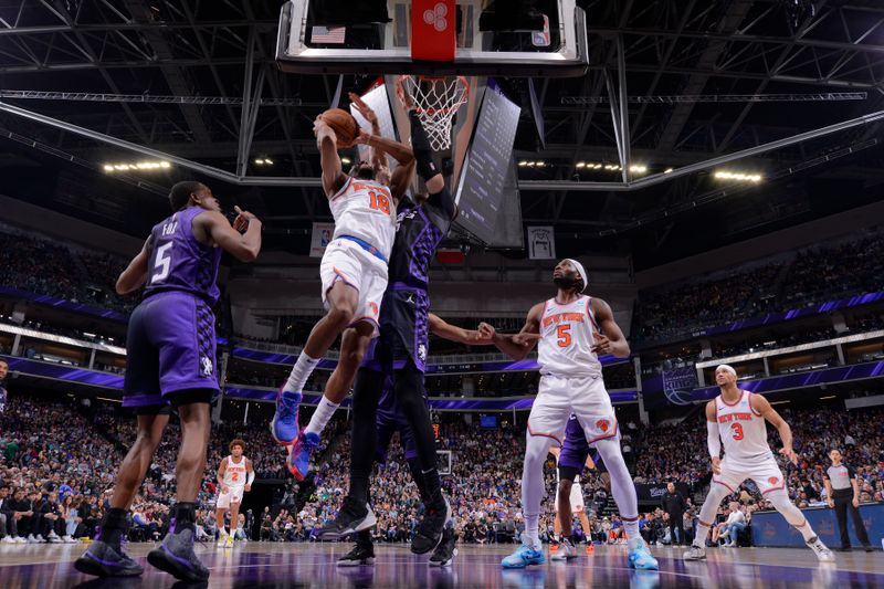 SACRAMENTO, CA - MARCH 16: Alec Burks #18 of the New York Knicks drives to the basket during the game against the Sacramento Kings on March 16, 2024 at Golden 1 Center in Sacramento, California. NOTE TO USER: User expressly acknowledges and agrees that, by downloading and or using this Photograph, user is consenting to the terms and conditions of the Getty Images License Agreement. Mandatory Copyright Notice: Copyright 2024 NBAE (Photo by Rocky Widner/NBAE via Getty Images)