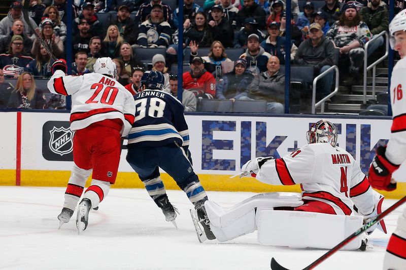 Feb 29, 2024; Columbus, Ohio, USA; Columbus Blue Jackets center Boone Jenner (38) chases down a rebound of a Carolina Hurricanes goalie Spencer Martin (41) save during the first period at Nationwide Arena. Mandatory Credit: Russell LaBounty-USA TODAY Sports