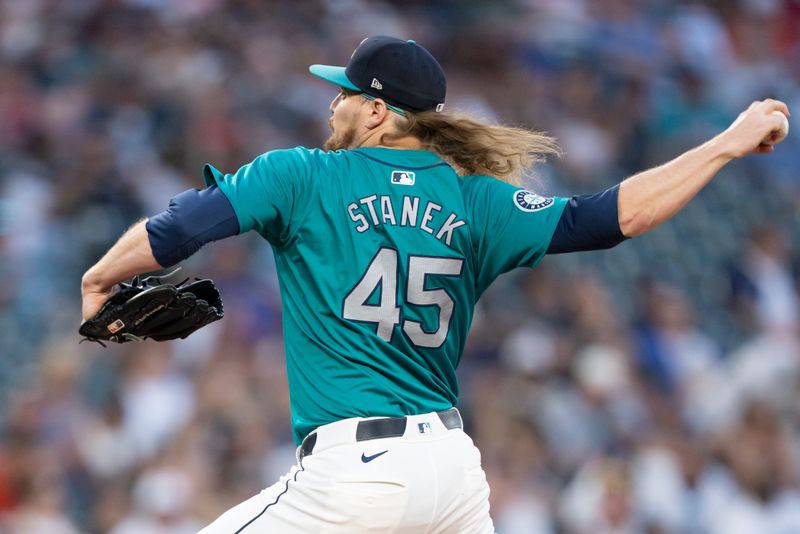 May 11, 2024; Seattle, Washington, USA; Seattle Mariners reliever Ryne Stanek (45) delivers a pitch during the seventh inning against the Oakland Athletics at T-Mobile Park. Mandatory Credit: Stephen Brashear-USA TODAY Sports