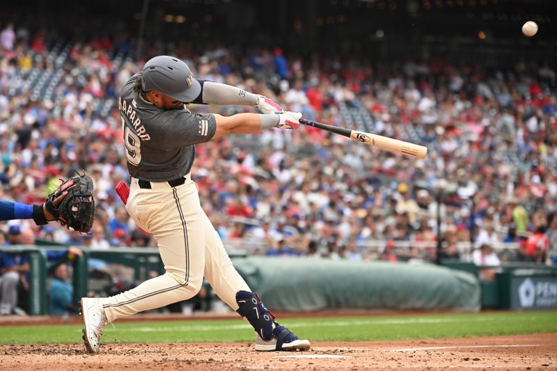 Aug 31, 2024; Washington, District of Columbia, USA; Washington Nationals third baseman Andres Chaparro (19) hits a home run against the Chicago Cubs during the fourth inning at Nationals Park. Mandatory Credit: Rafael Suanes-USA TODAY Sports