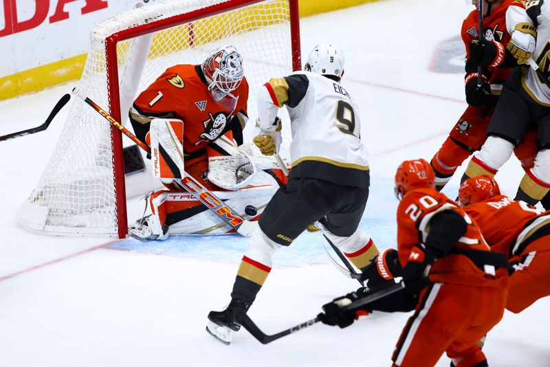 Nov 13, 2024; Anaheim, California, USA; Anaheim Ducks goaltender Lukas Dostal (1) makes a save against the Vegas Golden Knights during the third period of a hockey game at Honda Center. Mandatory Credit: Jessica Alcheh-Imagn Images