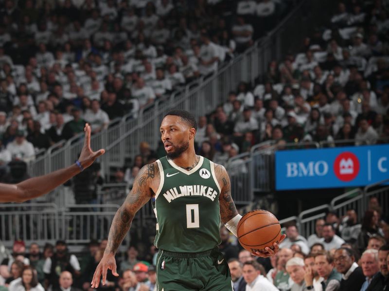 MILWAUKEE, WI - APRIL 23: Damian Lillard #0 of the Milwaukee Bucks handles the ball during the game against the Indiana Pacers during Round One Game Two of the 2024 NBA Playoffs on April 23, 2024 at the Fiserv Forum Center in Milwaukee, Wisconsin. NOTE TO USER: User expressly acknowledges and agrees that, by downloading and or using this Photograph, user is consenting to the terms and conditions of the Getty Images License Agreement. Mandatory Copyright Notice: Copyright 2024 NBAE (Photo by Gary Dineen/NBAE via Getty Images).