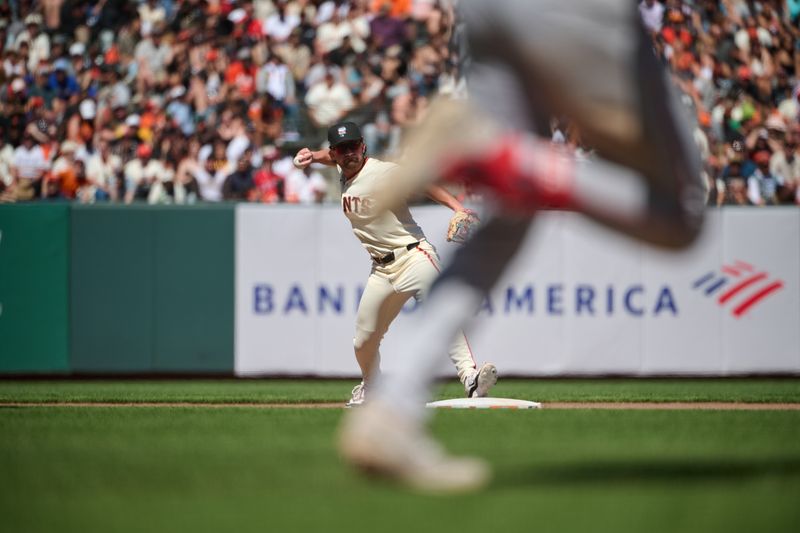 Jun 15, 2024; San Francisco, California, USA; San Francisco Giants infielder Brett Wisely (0) turns a double play against the Los Angeles Angels during the ninth inning at Oracle Park. Mandatory Credit: Robert Edwards-USA TODAY Sports