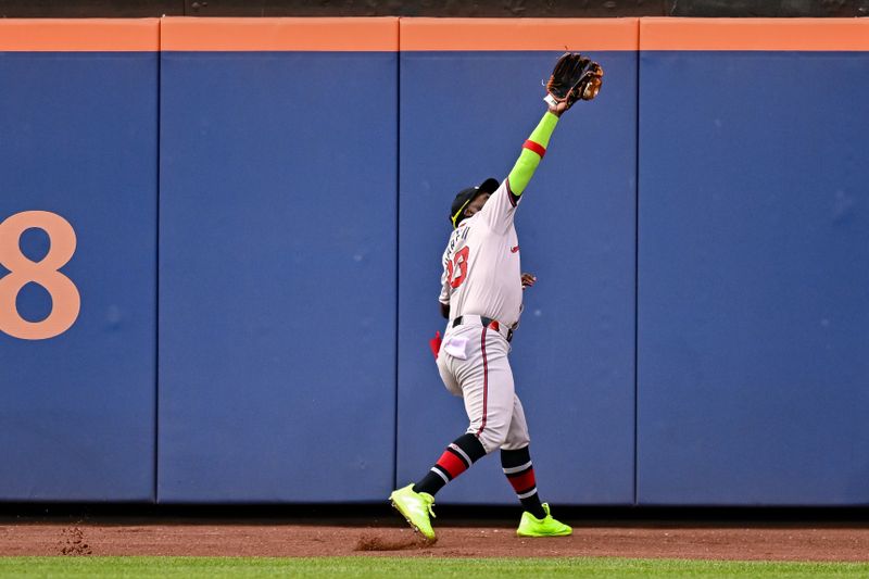 May 11, 2024; New York City, New York, USA; Atlanta Braves outfielder Michael Harris II (23) catches a fly ball for an out against the New York Mets during the seventh inning at Citi Field. Mandatory Credit: John Jones-USA TODAY Sports