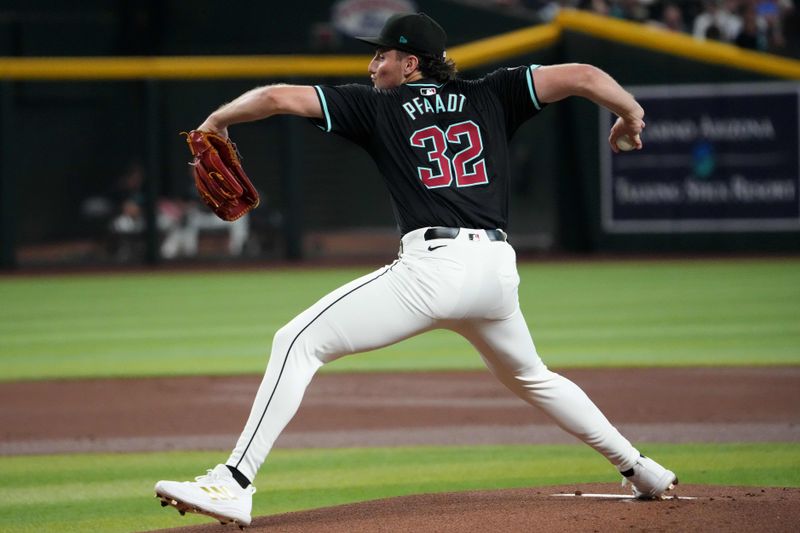 Jul 27, 2024; Phoenix, Arizona, USA; Arizona Diamondbacks pitcher Brandon Pfaadt (32) pitches against the Pittsburgh Pirates during the first inning at Chase Field. Mandatory Credit: Joe Camporeale-USA TODAY Sports