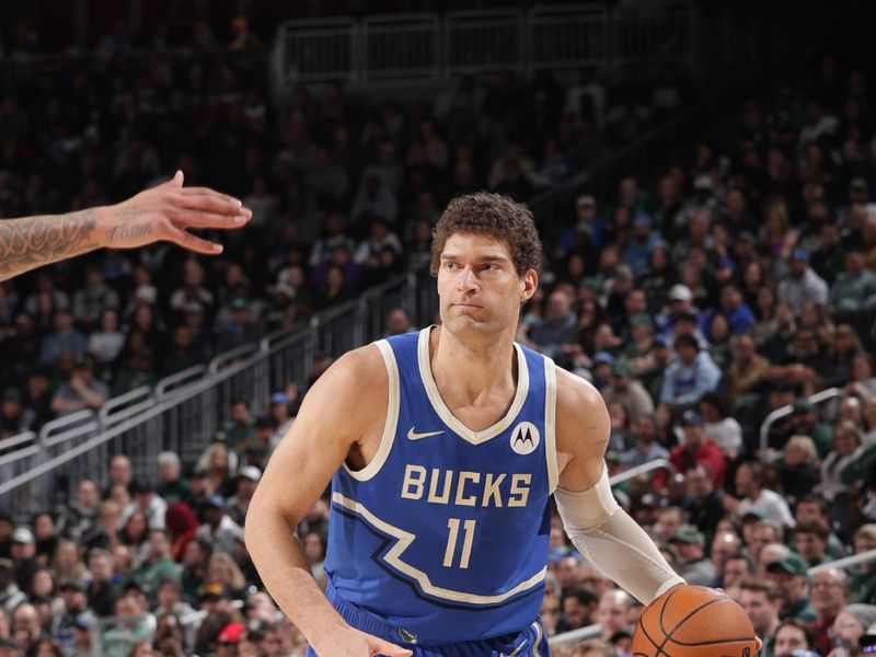 MILWAUKEE, WI - FEBRUARY 23:  Brook Lopez #11 of the Milwaukee Bucks dribbles the ball during the game against the Miami Heat  on February 23, 2025 at Fiserv Forum Center in Milwaukee, Wisconsin. NOTE TO USER: User expressly acknowledges and agrees that, by downloading and or using this Photograph, user is consenting to the terms and conditions of the Getty Images License Agreement. Mandatory Copyright Notice: Copyright 2025 NBAE (Photo by Gary Dineen/NBAE via Getty Images).