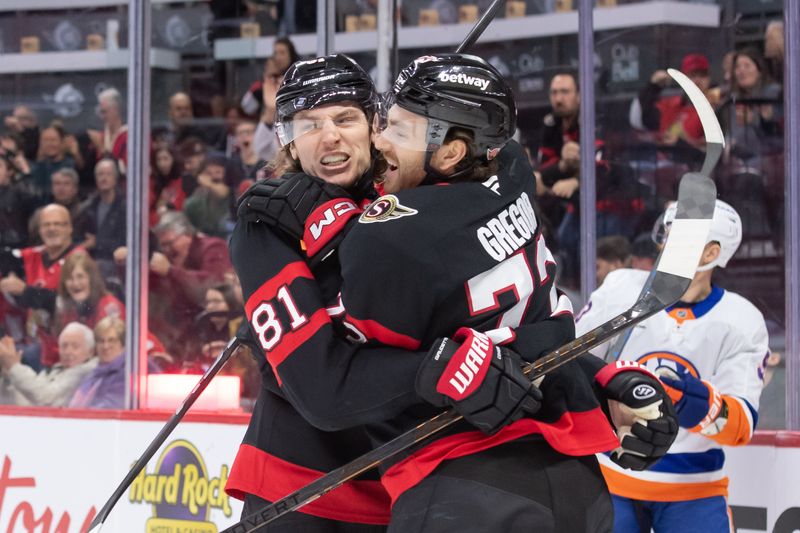 Dec 8, 2024; Ottawa, Ontario, CAN; Ottawa Senators right wing Adam Gaudette (81) celebrates with left wing Noah Gregor (73) his goal scored in the first period at the Canadian Tire Centre. Mandatory Credit: Marc DesRosiers-Imagn Images