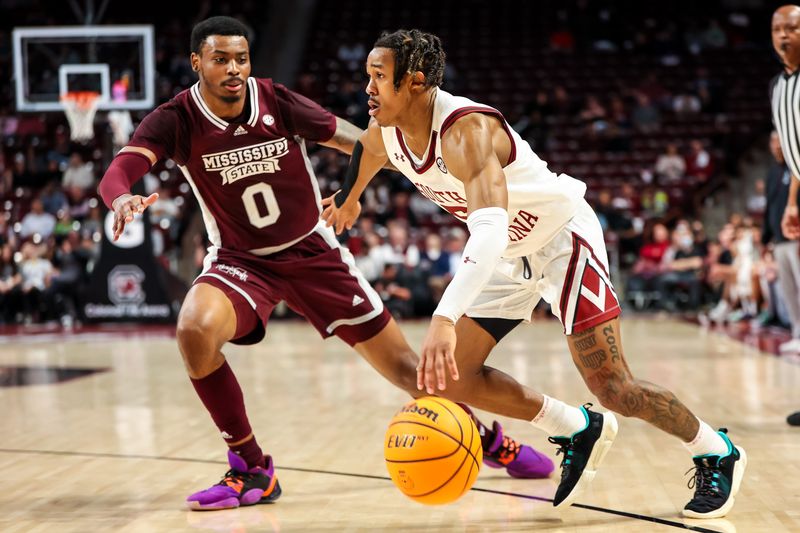 Jan 31, 2023; Columbia, South Carolina, USA; South Carolina Gamecocks guard Meechie Johnson (5) drives past Mississippi State Bulldogs forward D.J. Jeffries (0) in the first half at Colonial Life Arena. Mandatory Credit: Jeff Blake-USA TODAY Sports