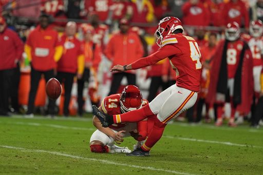 Kansas City Chiefs kicker Matthew Wright kicks a game-winning field goal as time expires in an NFL football game against the Los Angeles Chargers Sunday, Dec. 8, 2024, in Kansas City, Mo. (AP Photo/Charlie Riedel)